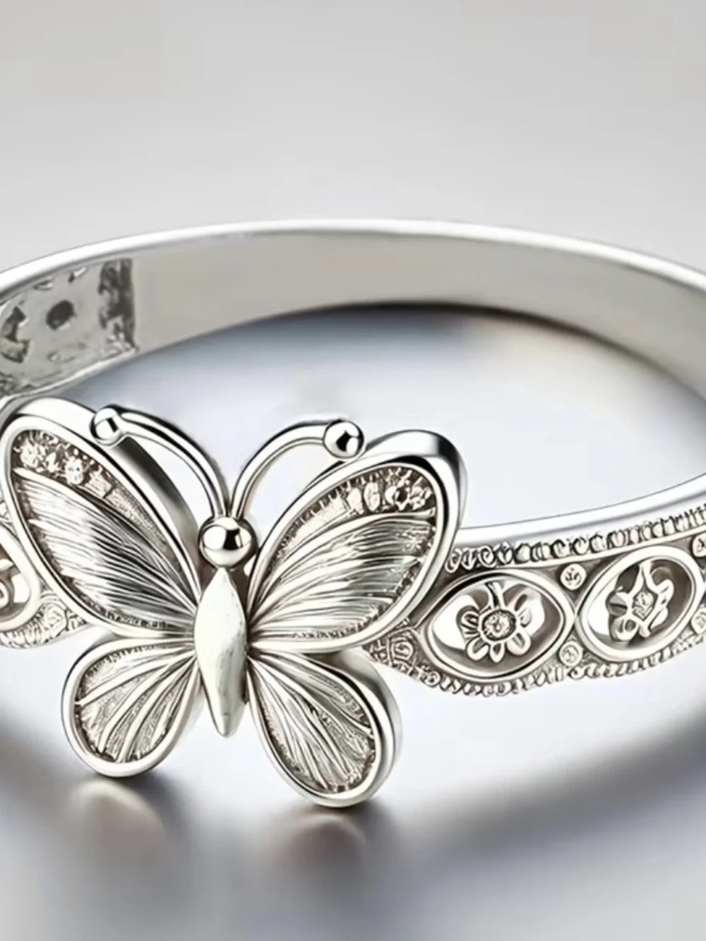 Butterfly Motif Silver Bangle Bracelet - Elegant Women’s Jewelry